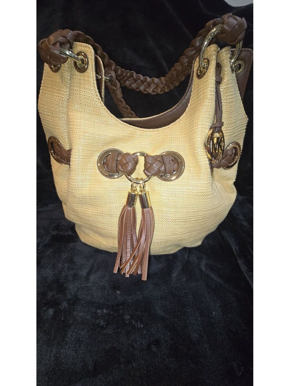 64. Michael Kors "Braided Grommet" hobo